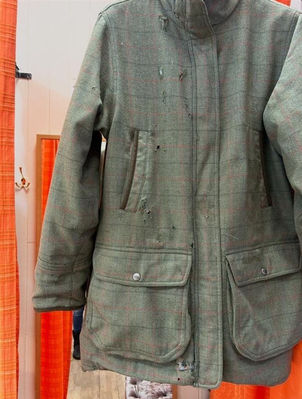 Tweed jacket with moth holes, before repair, view 1